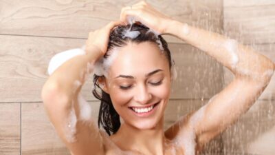 a woman washing her hair