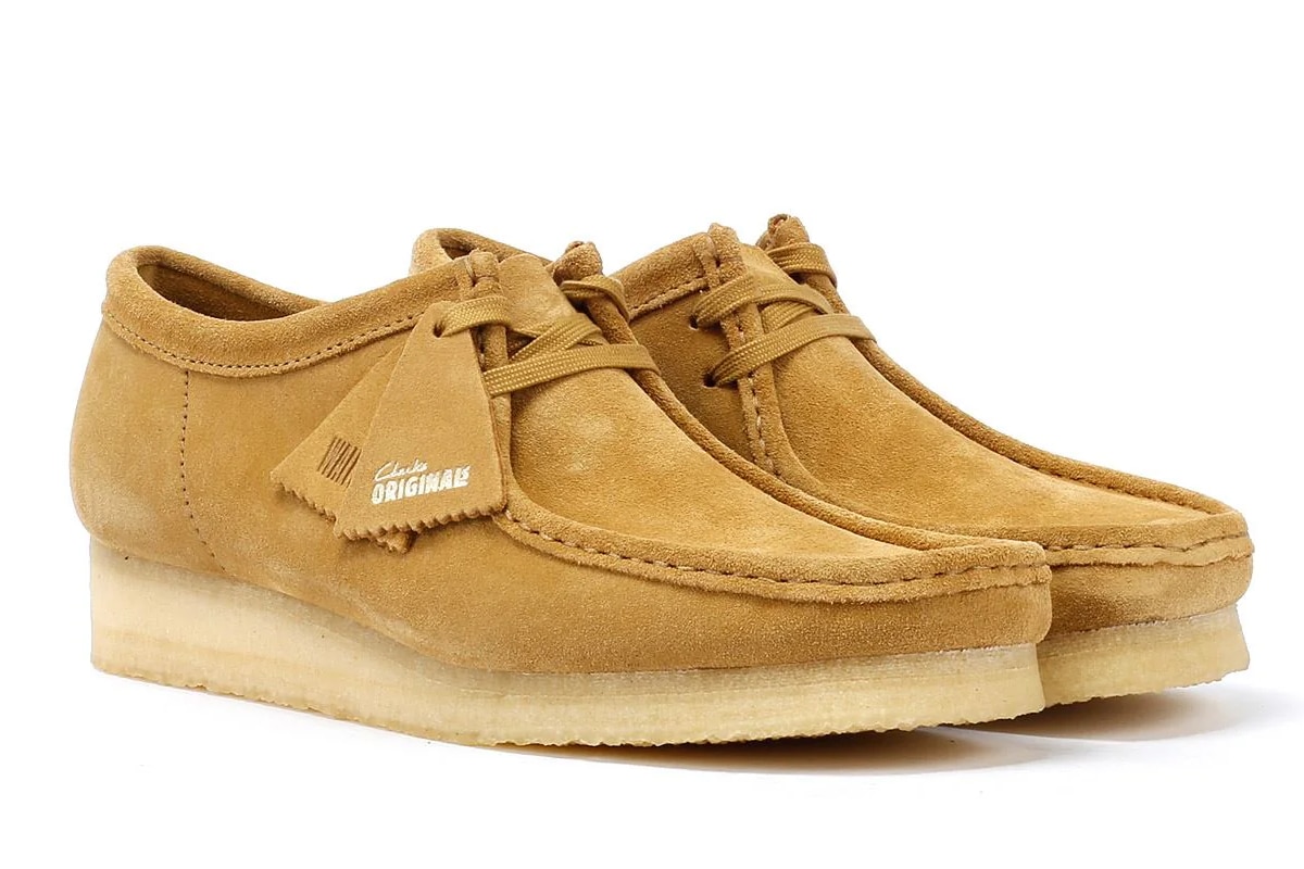 Les chaussures Wallabees de Clarks, un modèle iconique alliant confort et style décontracté.